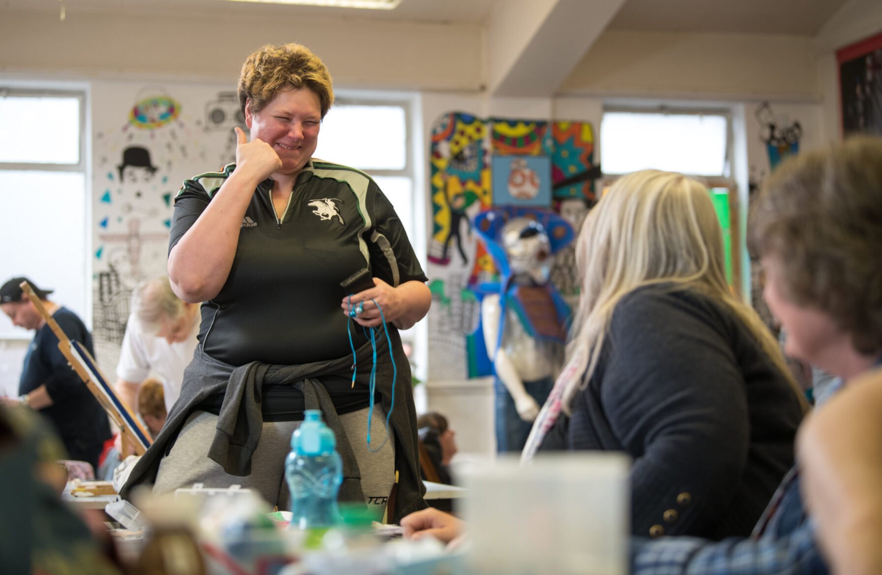 Smiling woman participating in a crafting session